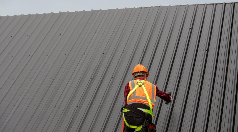 Professional metal roof installation services in Vallonia, IN